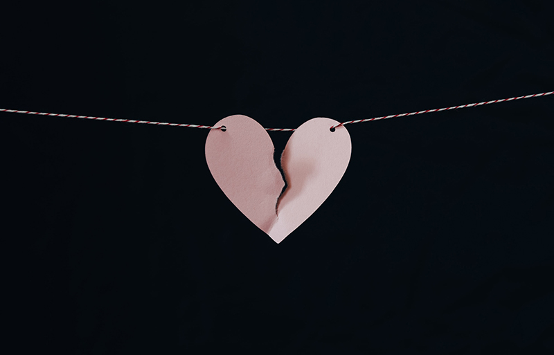 Picture of a paper broken heart.