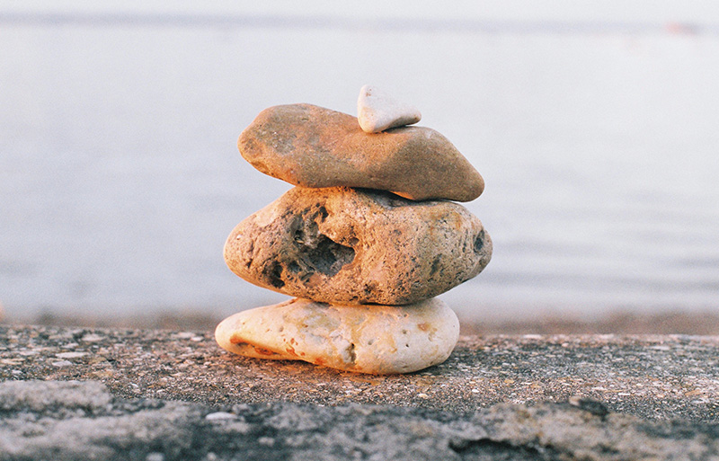 Mindfulness - Image of a pile of three stones symbolising mindfulness